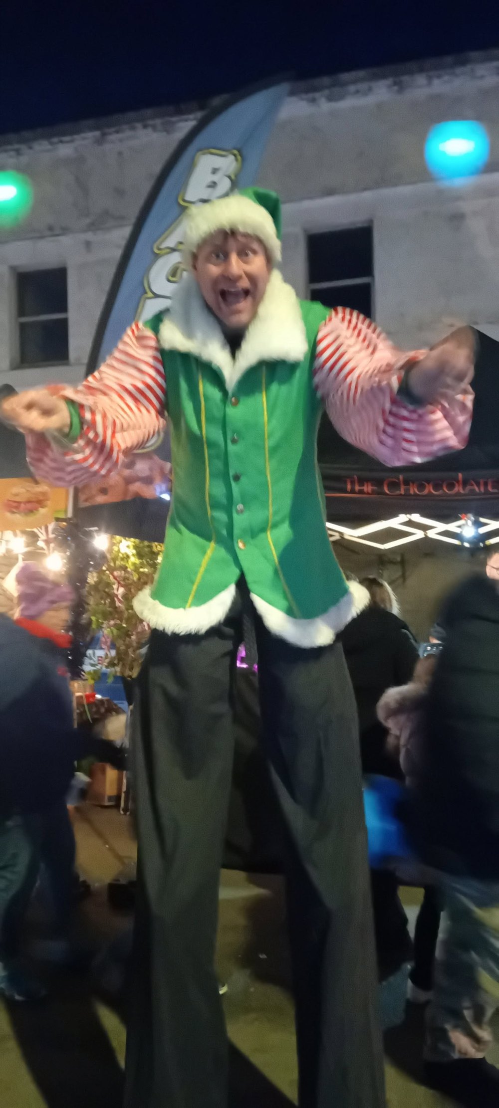 Christmas stilt walker